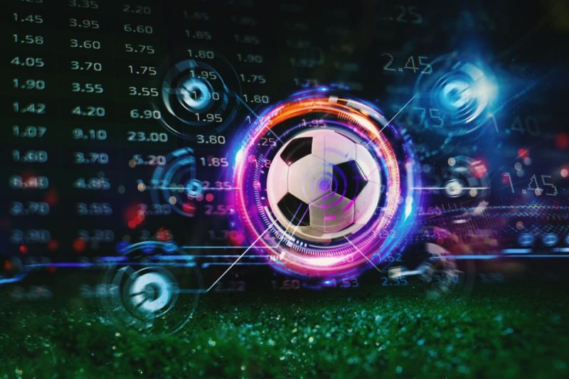 minge de fotbal pe un teren cu diverse cote de pariuri in fundal