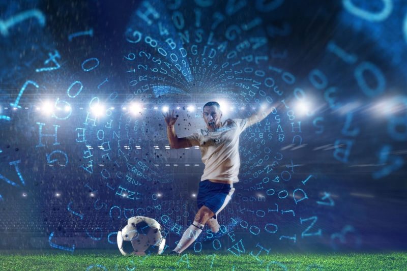 jucator de fotbal pe teren pregatit sa suteze, cu diverse cote de pariuri in jur